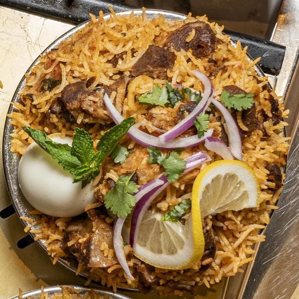Ambur Goat Biryani with basmati rice and goat chukka at Raja Chettinad