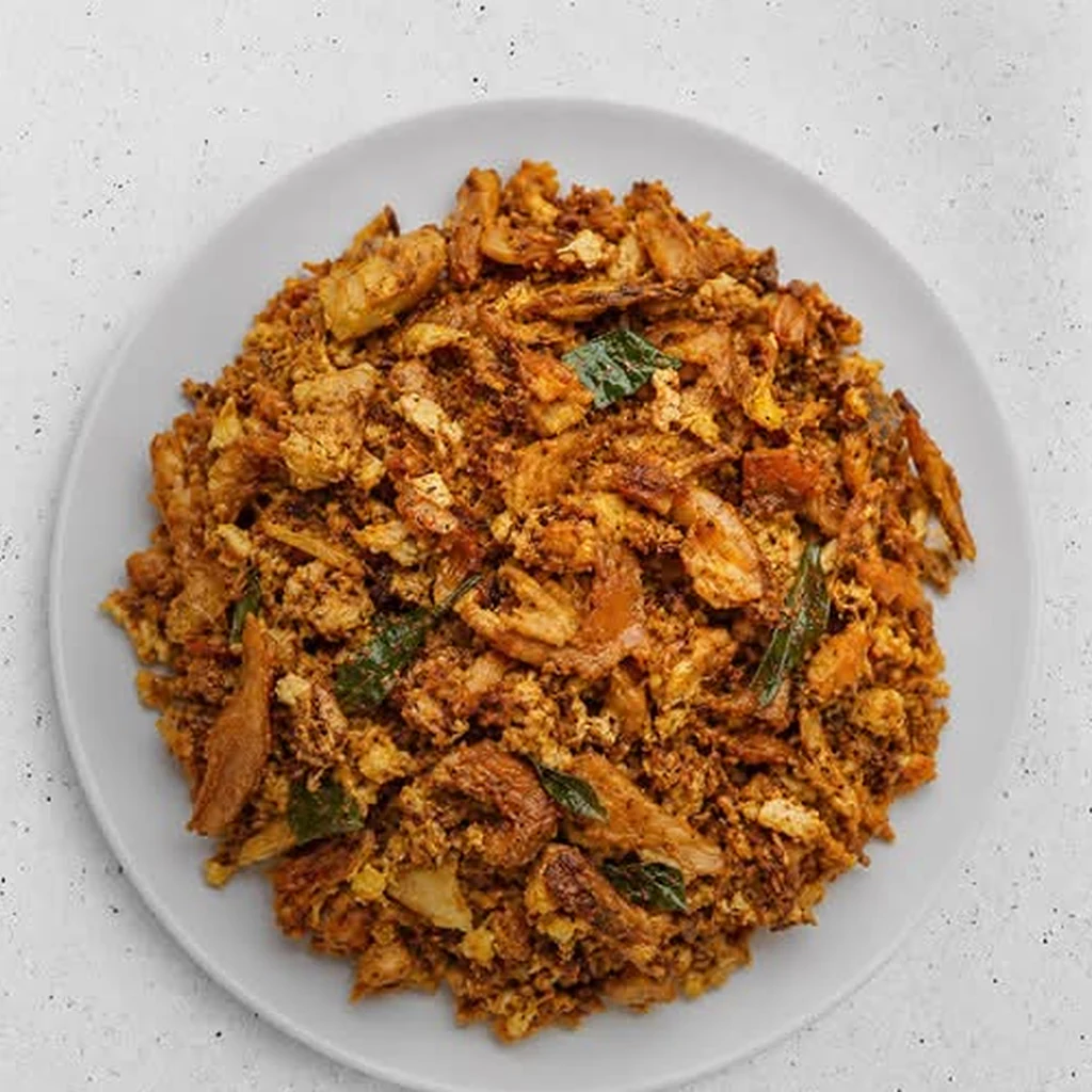 Chicken Kothu Parotta - chopped parotta tossed with chicken and egg at Raja Chettinad